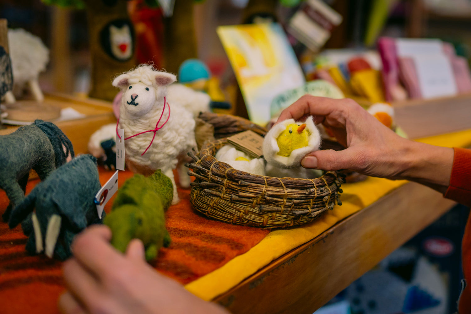 Hand made felted toys , sheep, crocodile, elephant and baby chick in an egg